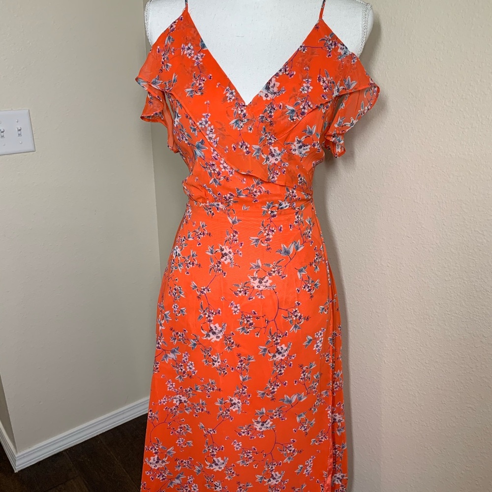 Flirty flair off the shoulder ruffed wrap dress